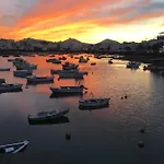 Casa Pescado, Madera Y Sol