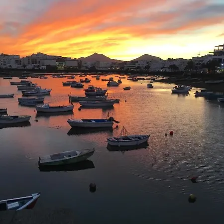 Casa Pescado, Madera Y Sol