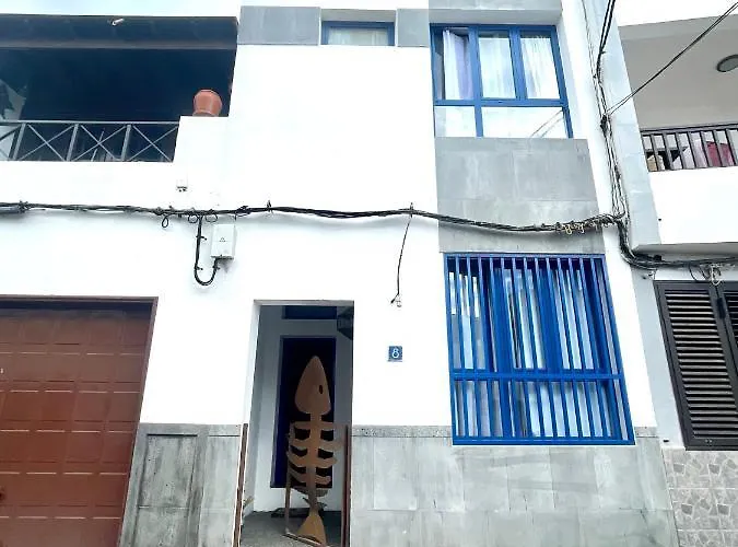 Casa Pescado, Madera Y Sol