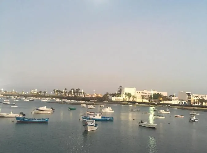 Casa Pescado, Madera Y Sol * أرّاثيفي