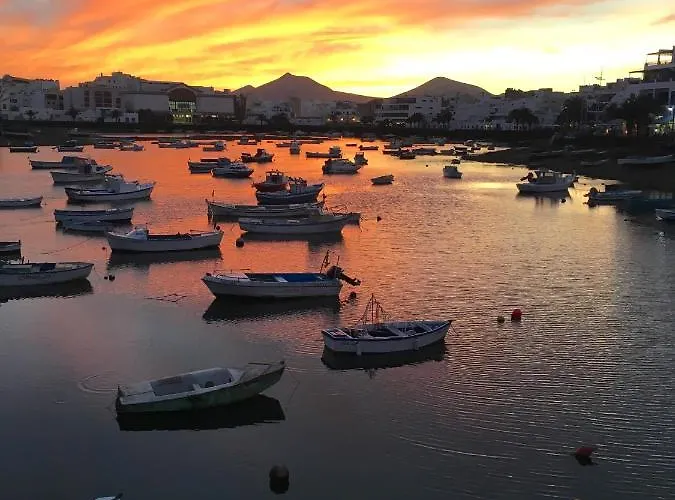 Casa Pescado, Madera Y Sol